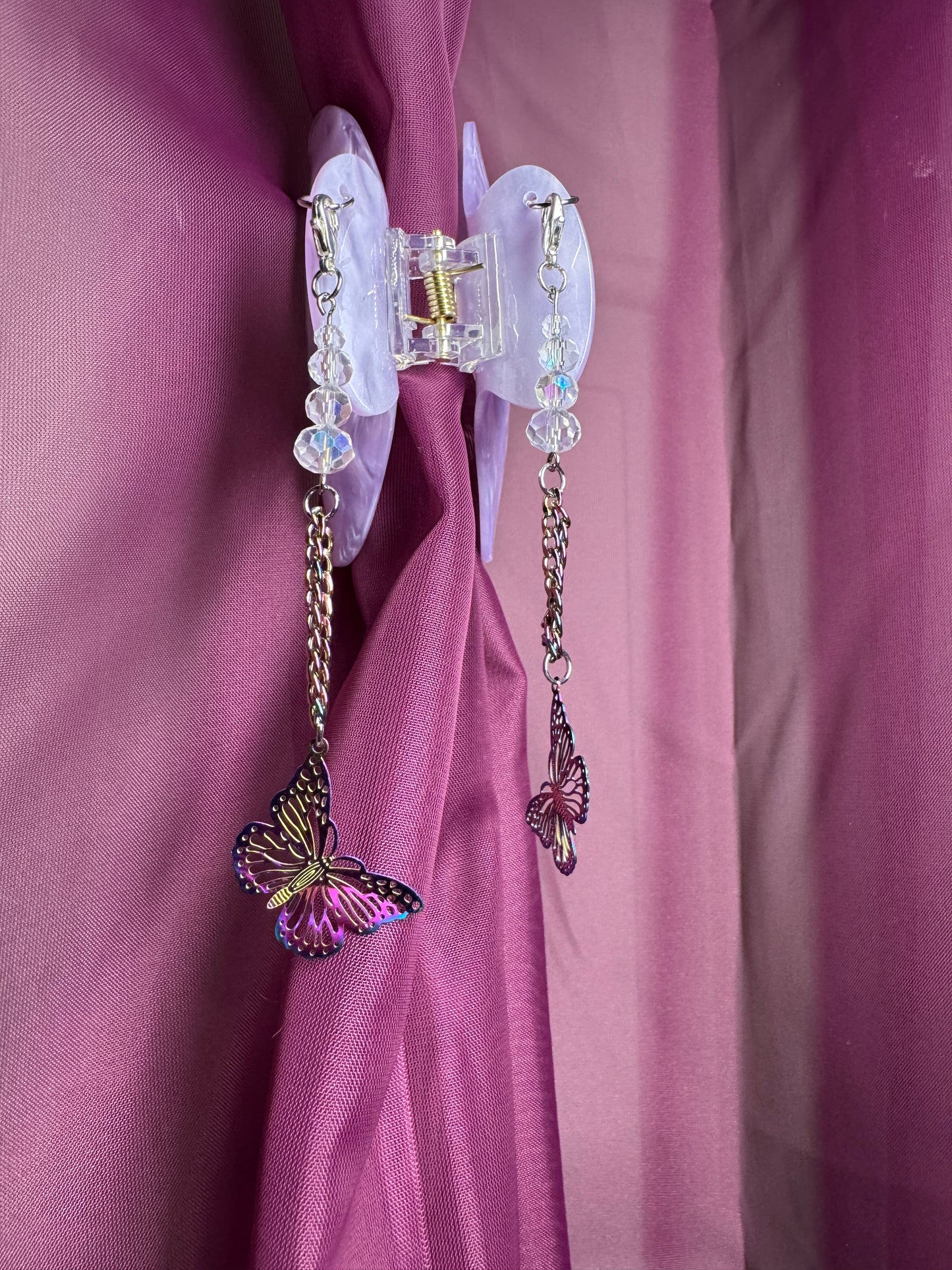 Purple hair claw with butterfly charms