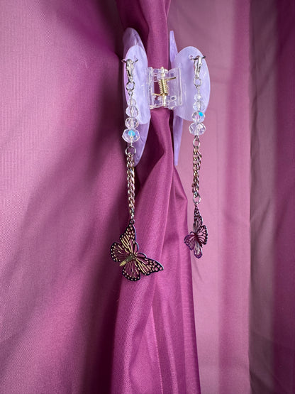 Purple hair claw with butterfly charms