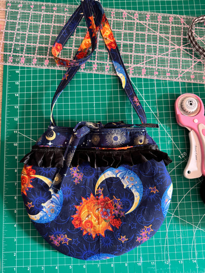 Round celestial moon purse