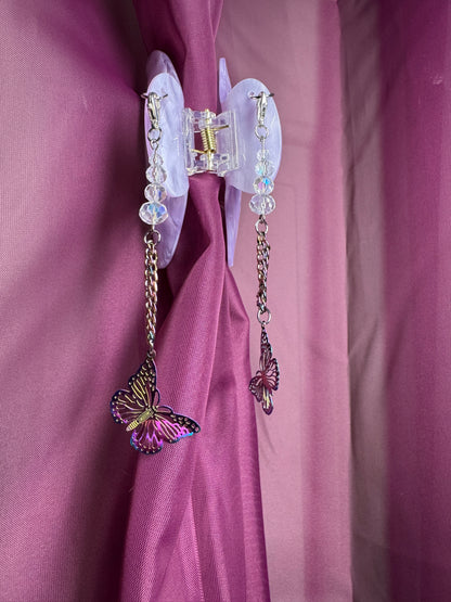Purple hair claw with butterfly charms