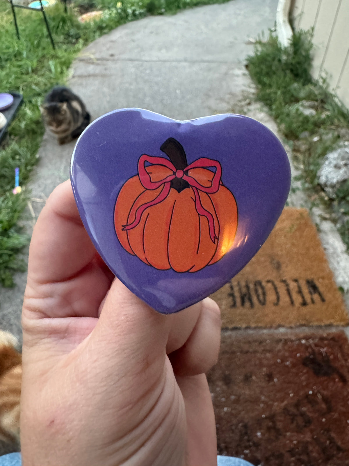 Pumpkin heart shaped 2.25 inch button